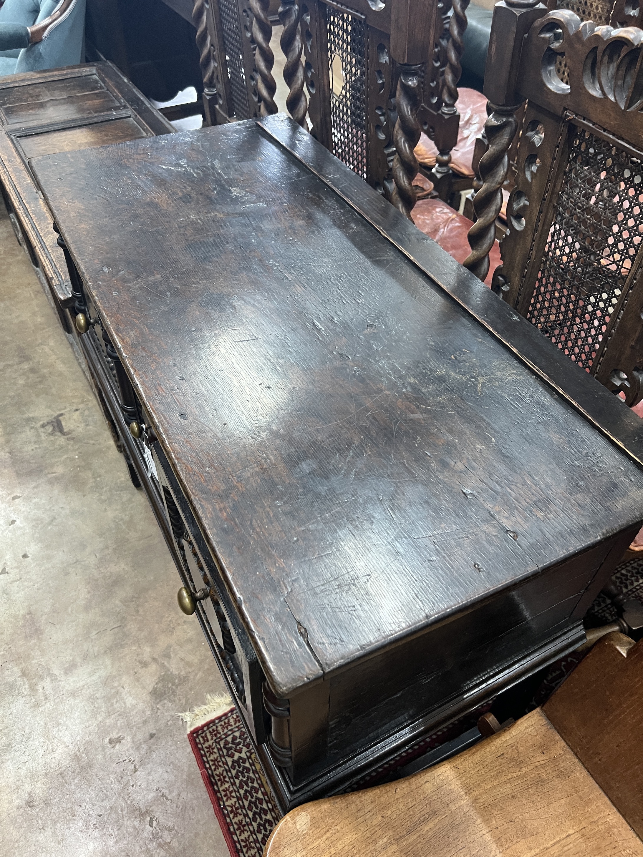 An 18th century style small oak three drawer low dresser, width 98cm, depth 46cm, height 79cm